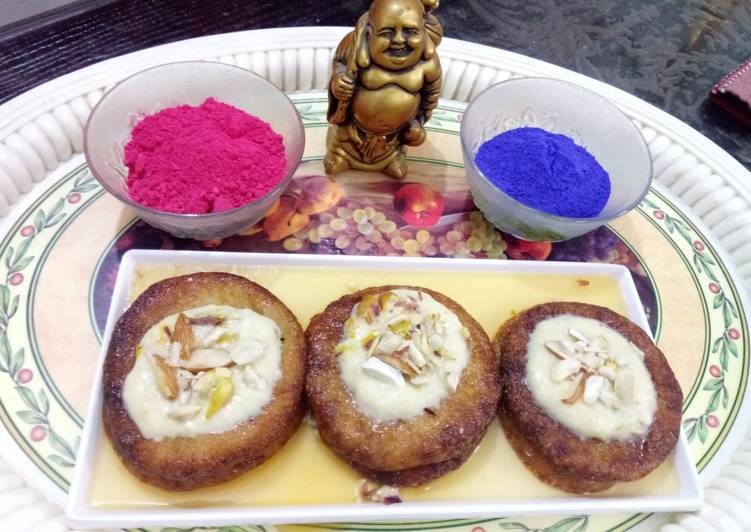 Orange malpua with Rabadi