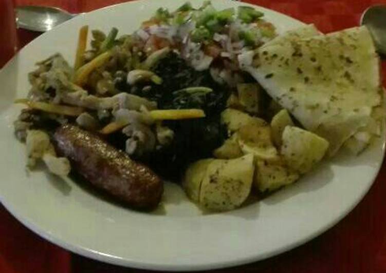 African breakfast sausages, pancakes, salad with kachumbari