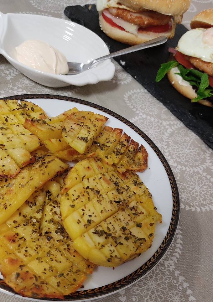 Una foto de Patatas especiadas al horno