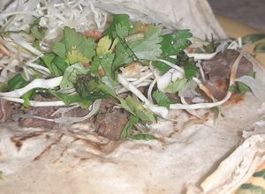 Una foto de Tacos de chambarete de res