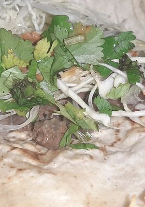 Una foto de Tacos de chambarete de res