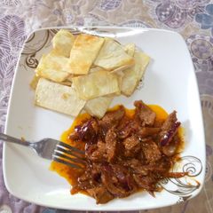 Fried yam with Beef sauces A picture of Fried yam with Beef sauces.