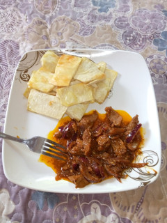 A picture of Fried yam with Beef sauces.