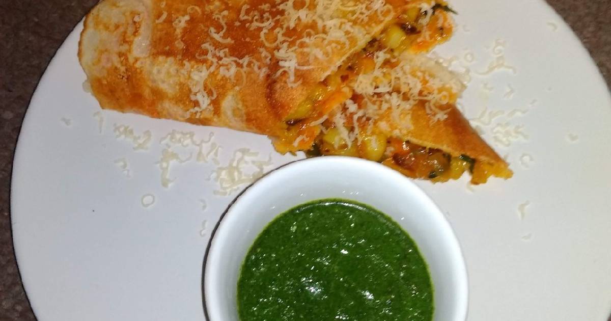 Shezwan masala cheese Dosa roll Recipe by Raghini Phad Cookpad