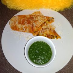 A picture of Shezwan masala cheese Dosa roll.