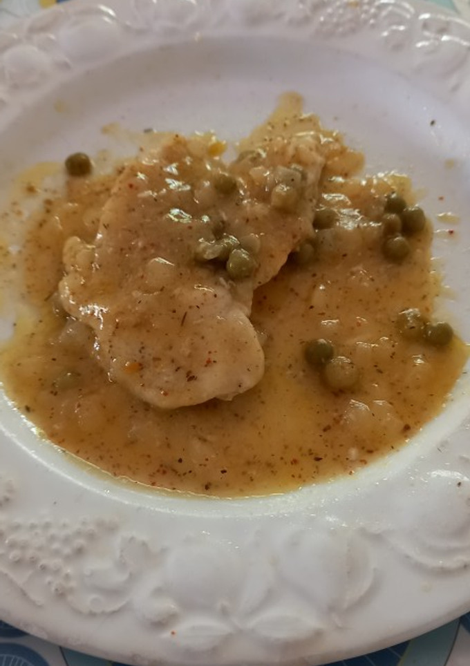 Una foto de 169. Filetes de pollo con guisantes