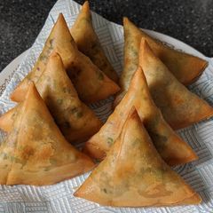 A picture of Instant Samosa by using spring roll wrappers.