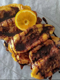 Una foto de Torrijas Caseras con naranja y chocolate