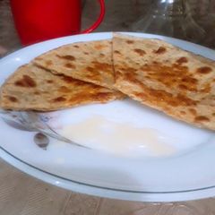 A picture of Cheeni ka paratha.