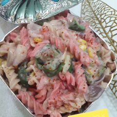 A picture of Two colour cheesey pasta valentine day special.