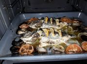 Una foto de mojarras al ajo