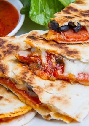 A picture of Cheese burst Pizza Quesadilla.