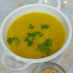 A picture of Moong dal Daliya with Amla.