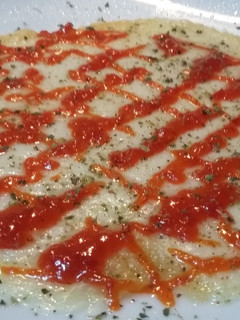 Una foto de Provolone con mermelada de morrones