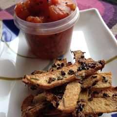 A picture of Yam Chips with Tomato Chutney.