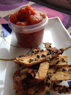 A picture of Yam Chips with Tomato Chutney.