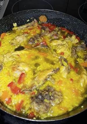 Una foto de Arroz con carcasa de pollo