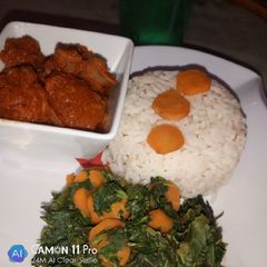 A picture of White rice with spinach.