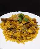 Arroz con codornices mollejas de pollo y setas shiitake