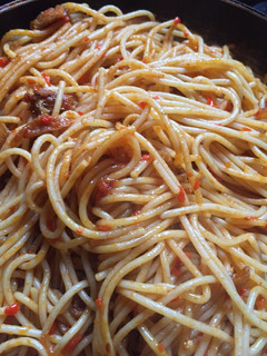 A picture of Stir-fry jollof spaghetti.