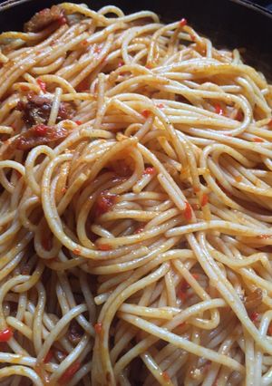 A picture of Stir-fry jollof spaghetti.