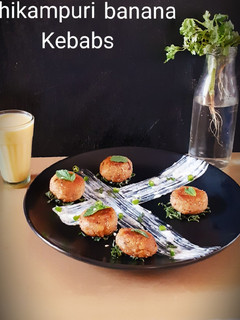 A picture of Shikaumpuri banana Kebabs.