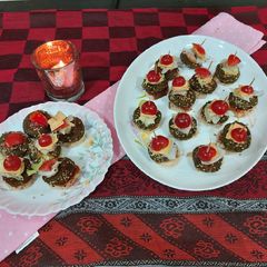 Spinach/split chickpea kababs with cheese salad A picture of Spinach/split chickpea kababs with cheese salad.