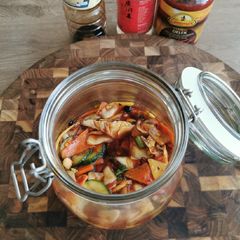 A picture of Spicy cabbage, carrot and cucumber pickle.