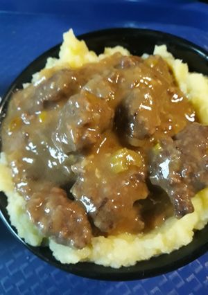 A picture of Golden Mashed Potatoes and Beef Square Gravy.