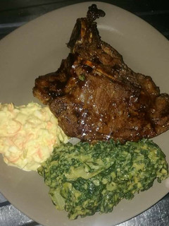 A picture of Grilled Beef steak, Creamed Spinach with coselaw.