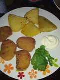 Papas doradas con nugget de pollo