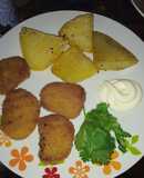Papas doradas con nugget de pollo