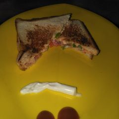 A picture of Cheesy mayo Schezwan veg sandwich.