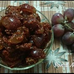 A picture of Fresh grapes with pickle masala.