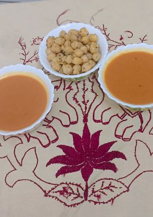A picture of Rooted Warmth Carrot–Ginger Soup (with Protein Chhole Crunch).