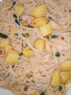 A picture of Jollof spaghetti.