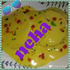 Bread rasmalai in custard A picture of Bread rasmalai in custard.