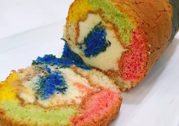 Recipe: Appetizing ROLLED FLUFFY RAINBOW CAKE with LEMON BUTTER FROSTING