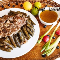 A picture of Stuffed Vine leaves with rice and minced meat.