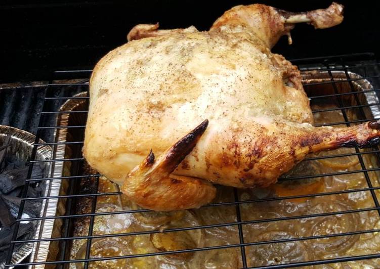 Whole roasted chicken on the grill