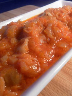 Una foto de Repollo con salsa de pimientos rojos