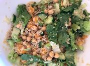 A picture of fruits and chick peas salad