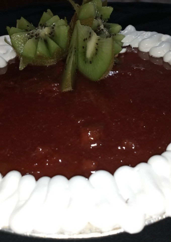 Una foto de Cheesecake New York con compota de fresas