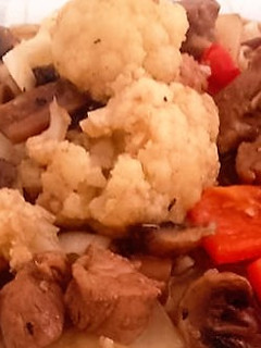 Una foto de Cerdo teriyaki con coliflor