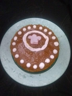 A picture of Vanilla tutti fruity cake with Mango topping.
