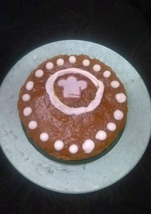 A picture of Vanilla tutti fruity cake with Mango topping.