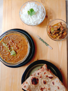 A picture of Masoor Dal with roti & chawal.