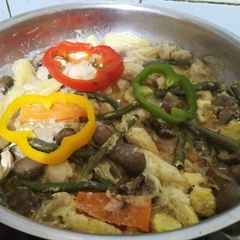 A picture of Cheesy chicken and vegetable skillet.