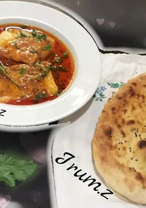 A picture of 🐟🍲🌮Fish Curry with Homemade Naan🌮🍲🐟.