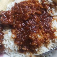 A picture of Banana wt white rice n stew.